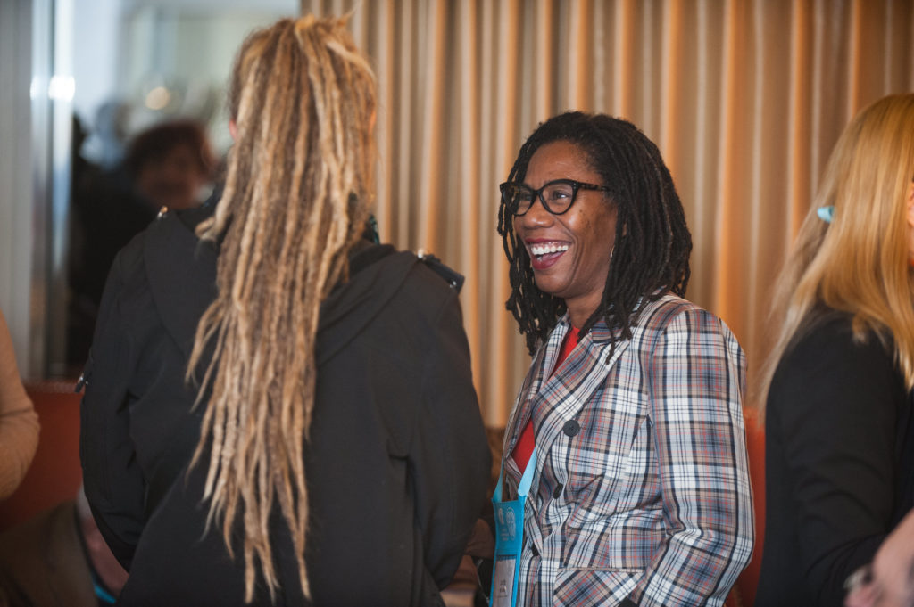 Photo of two donors smiling at each other at the Donor Reception in 2019